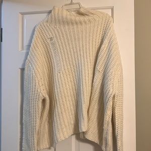 Brand New Umgee short oversized cream sweater. Large but fit more like a Xl.RB